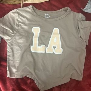 Crop Top LA shirts , worn couple times , good condition .